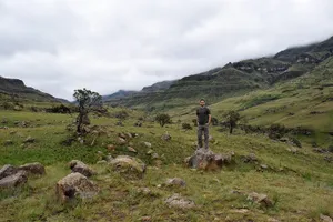Man in front of green landscape near Lesotho border